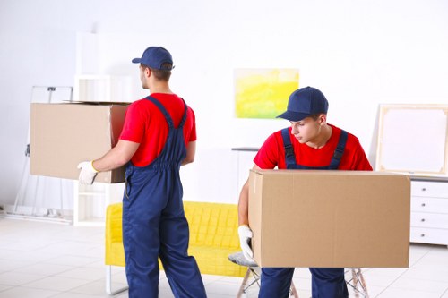 Removal team protecting furniture during a safe house move