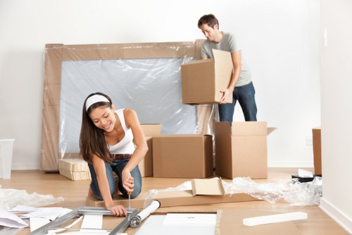 Moving team loading household items during a Hackney removals service