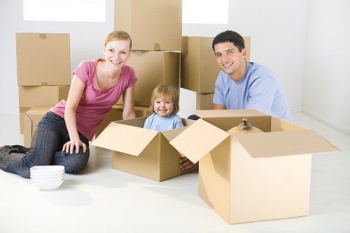 Boxes and furniture being prepared for a Hackney removal in an urban London home
