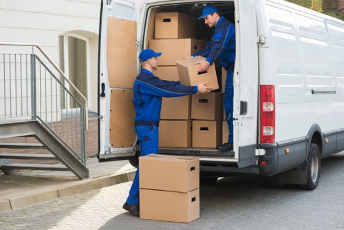 Local moving team preparing household items in Hackney
