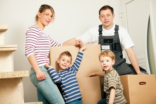 Business relocation items being loaded into a moving van in Hackney