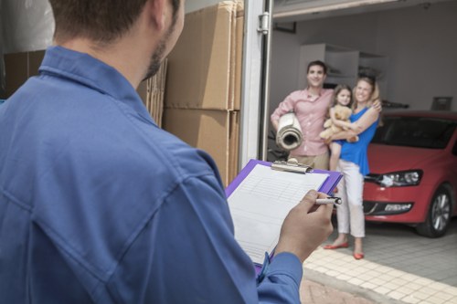 Removal team planning a move on a Hackney street