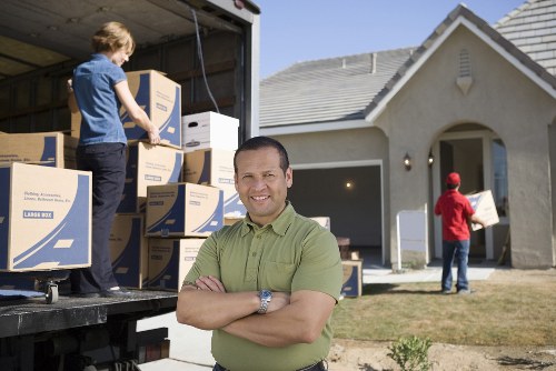 A moving van servicing flats and homes across Hackney