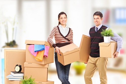 Preparing boxes and furniture for a removals van in Hackney