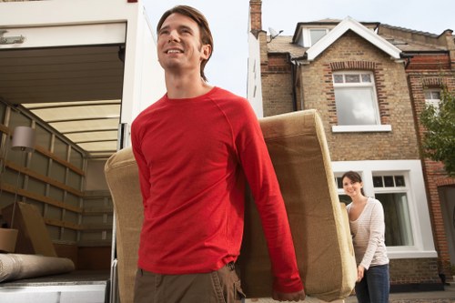Packed boxes and furniture ready for local removals
