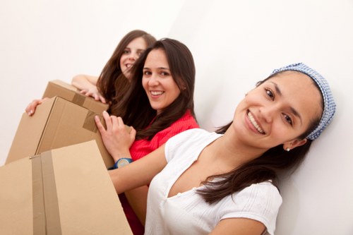 A resident planning a Hackney move with organised packed boxes