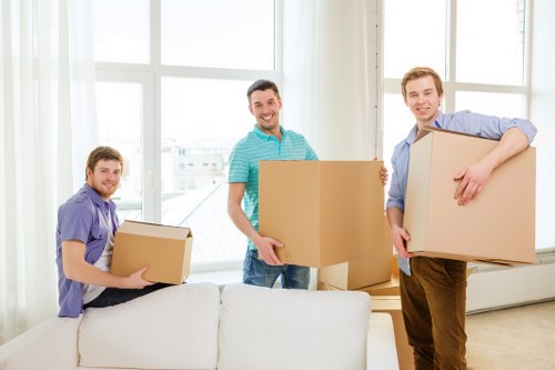 Removal van and team handling a flat move in East London