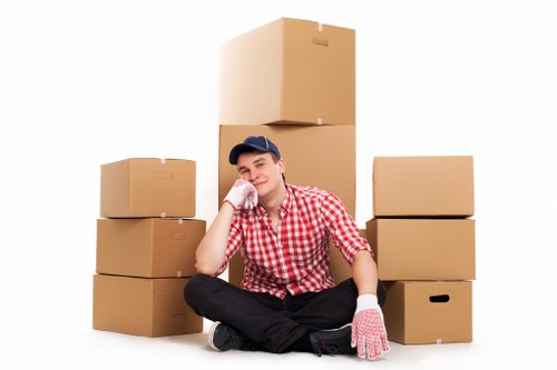 Careful handling of office equipment during a commercial move in Hackney
